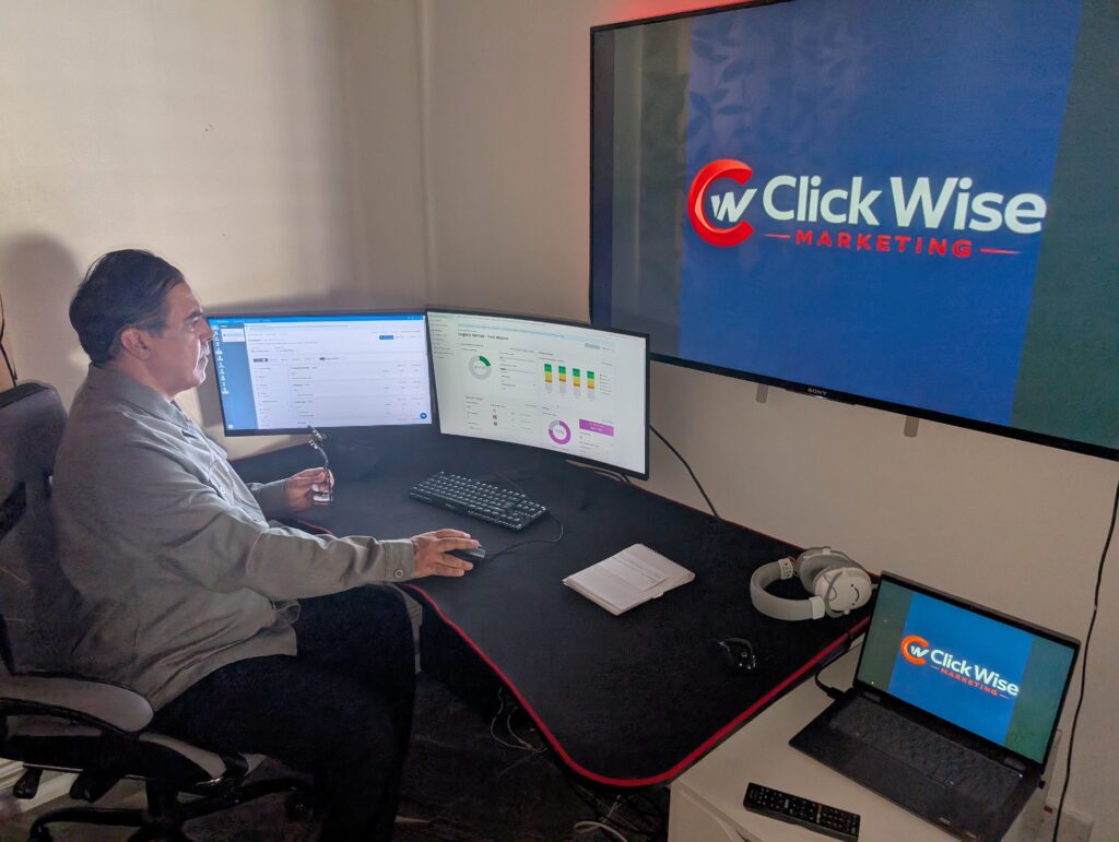 Rachid Belmehdi working at the ClickWise Marketing office in Croydon managing local SEO campaigns.